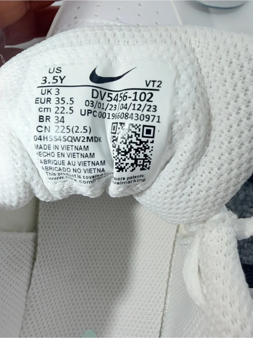 Nike Kids White Sneakers with Mint Green Swoosh